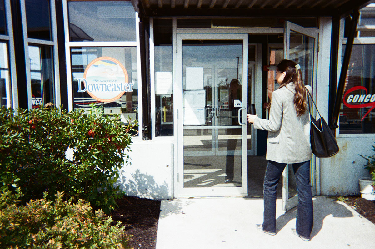 woman enters station